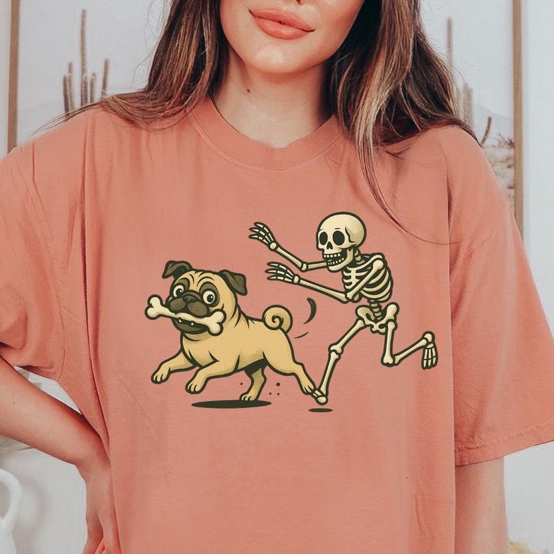Funny Skeleton Chasing PUG Dog Halloween T-Shirt | Spooky Graphic Tee Comfort Colors Style 100% Ring-Spun Cotton Unisex Casual Top